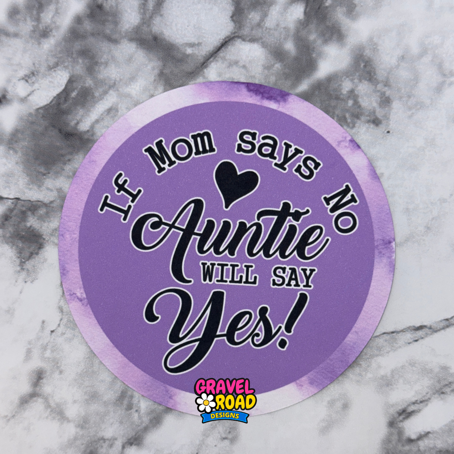 Purple round cardstock with text 'If Mom says no, Auntie will say yes!' on a marble background