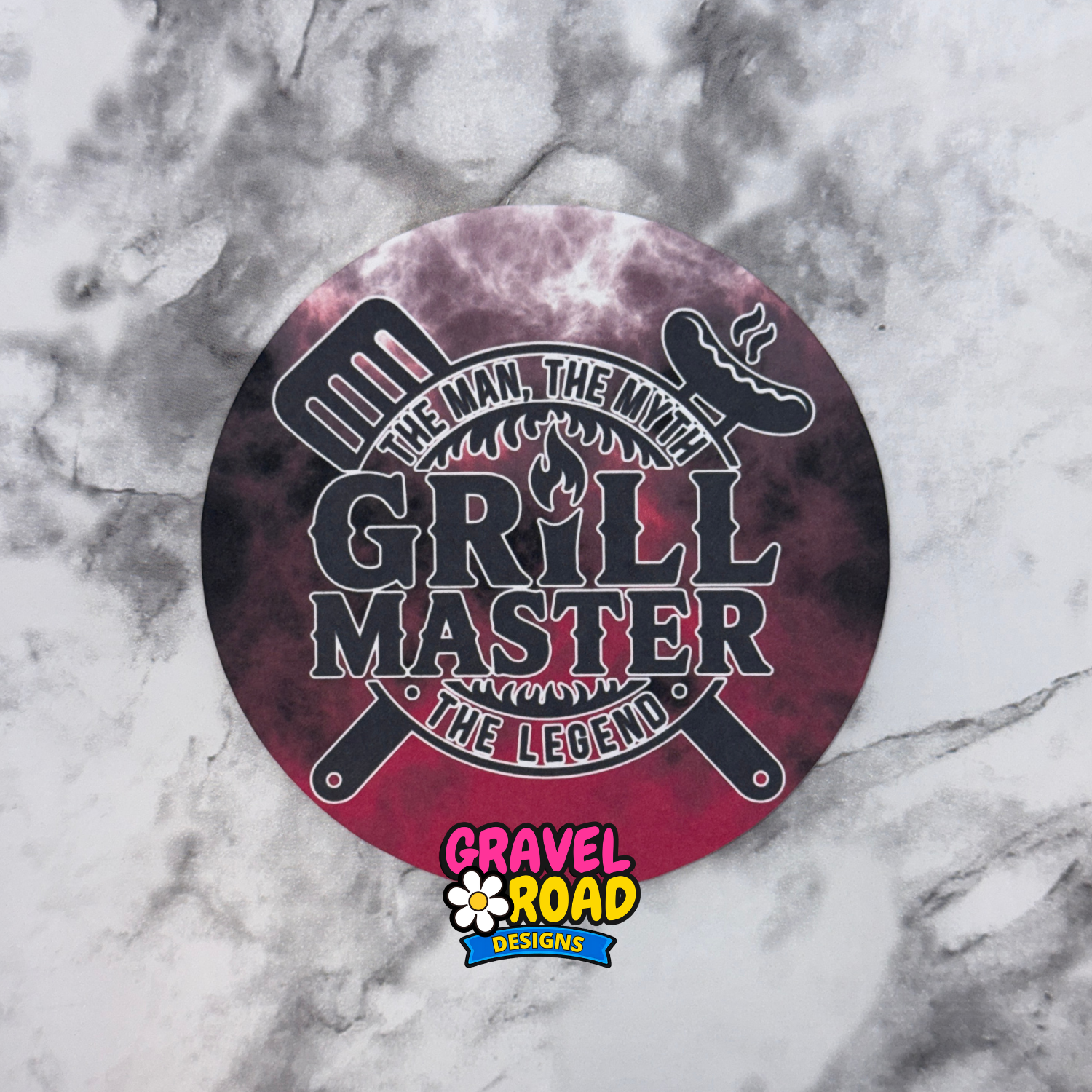 Round cardstock with fire and smoke background with 'Grill Master' design on a marble background