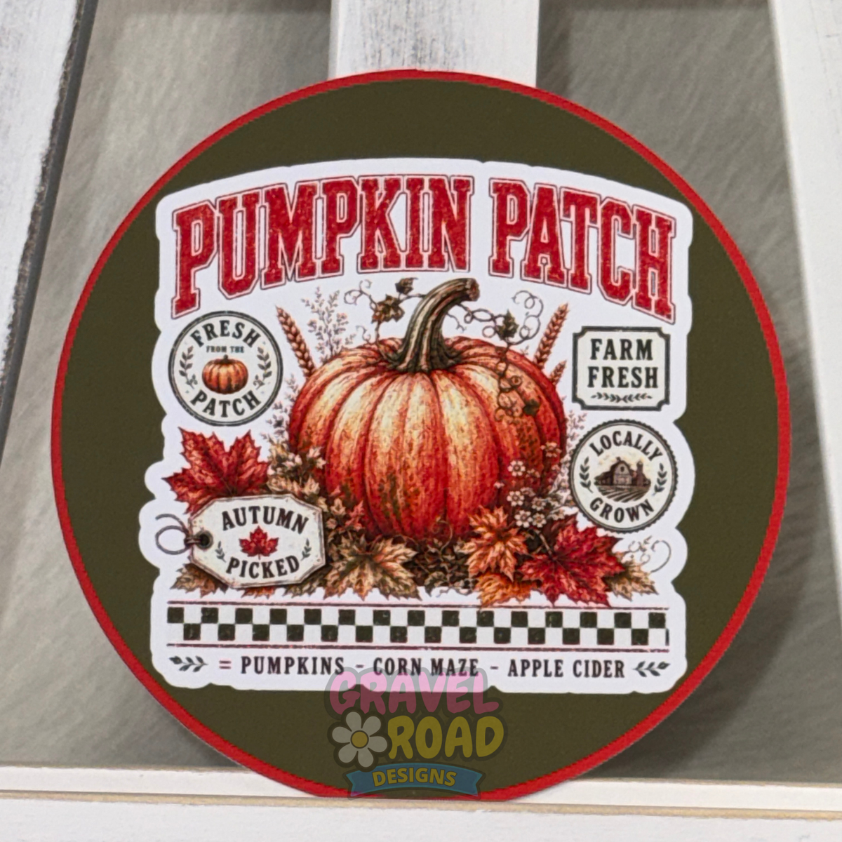Round fall cardstock featuring a large pumpkin, autumn leaves, vintage farm labels, and bold red “Pumpkin Patch” lettering.
