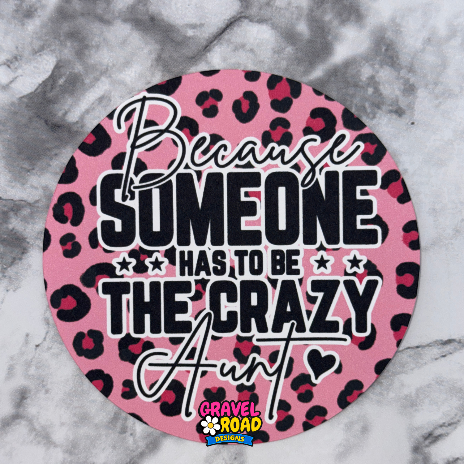 Pink leopard print round cardstock with text on a marble background