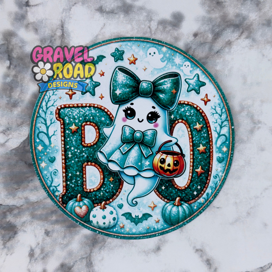 Circular design with a ghost character, pumpkins, and decorative text on a marble background.