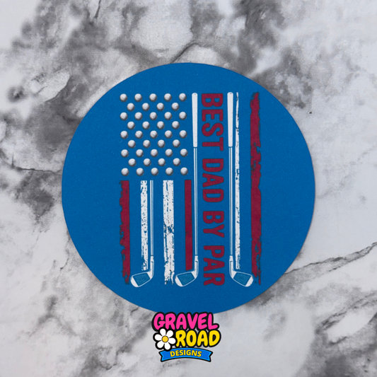 Blue round cardstock with American flag design and text 'Best Dad by Par' on a marble background, featuring Gravel Road Designs logo.