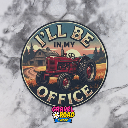 Circular cardstock design with a red tractor and text 'I'll be in my office' on a marble background, featuring the Gravel Road Designs logo.